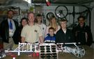Brian Turner and his motley crew of Space Pirates pose in their garage with their solar-powered climber. 